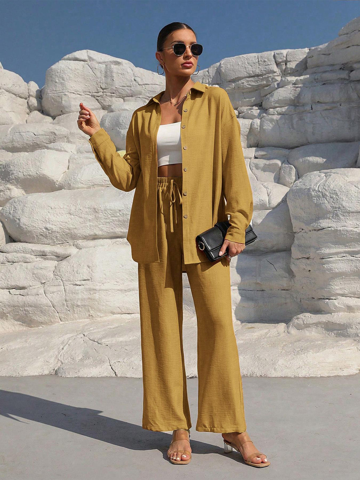 A Casual Two-Piece Set Long-Sleeve Button-Up Shirt with an Elastic Waist, Along with Loose Wide-Leg Trousers