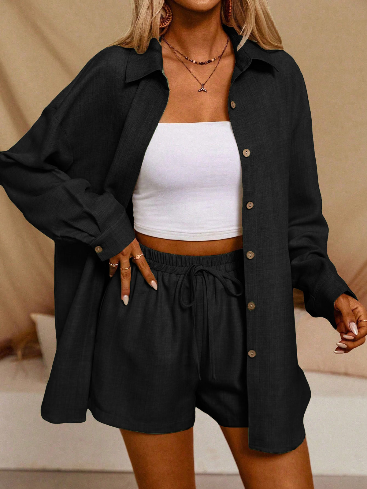 A Casual Two-Piece Set Long-Sleeve Button-Up Shirt with an Elastic Waist, Along with Loose Wide-Leg Trousers