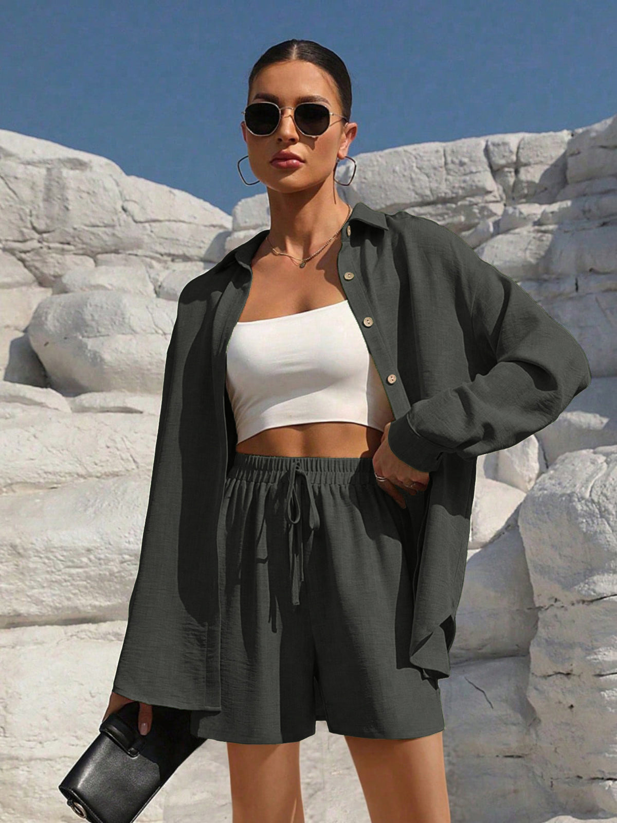 A Casual Two-Piece Set Long-Sleeve Button-Up Shirt with an Elastic Waist, Along with Loose Wide-Leg Trousers