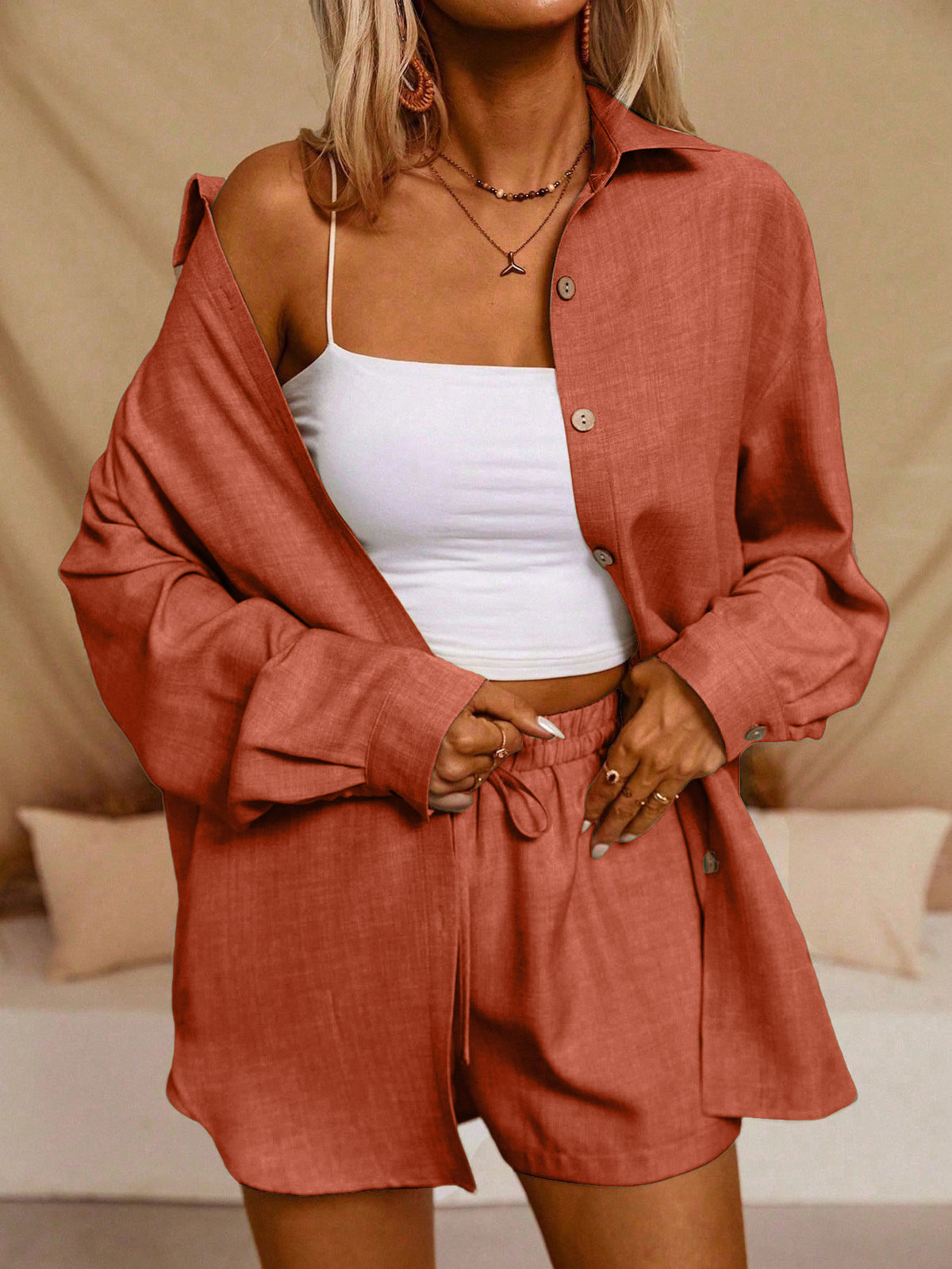 A Casual Two-Piece Set Long-Sleeve Button-Up Shirt with an Elastic Waist, Along with Loose Wide-Leg Trousers